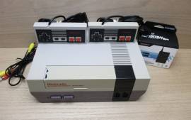 For sale Nintendo NES console with 2 controllers and cables, USD 90