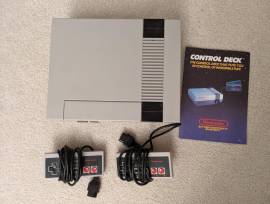 For sale Nintendo Nes NTSC console with controls and manual, USD 40
