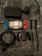 Sell nintendo switch console with original accessories, USD 180