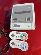 For sale Super Nintendo SNES console with 2 controllers, € 55
