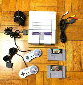 For sale console Super Nintendo SNES NTSC version + 2 games like new, € 250.00