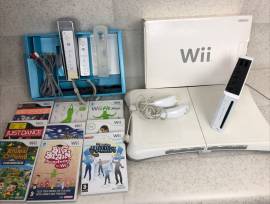 For sale Nintendo Wii console with Wii Fit and 9 games, USD 65