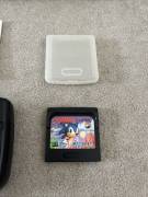 For sale Game Gear console with 1 game and charger, USD 125